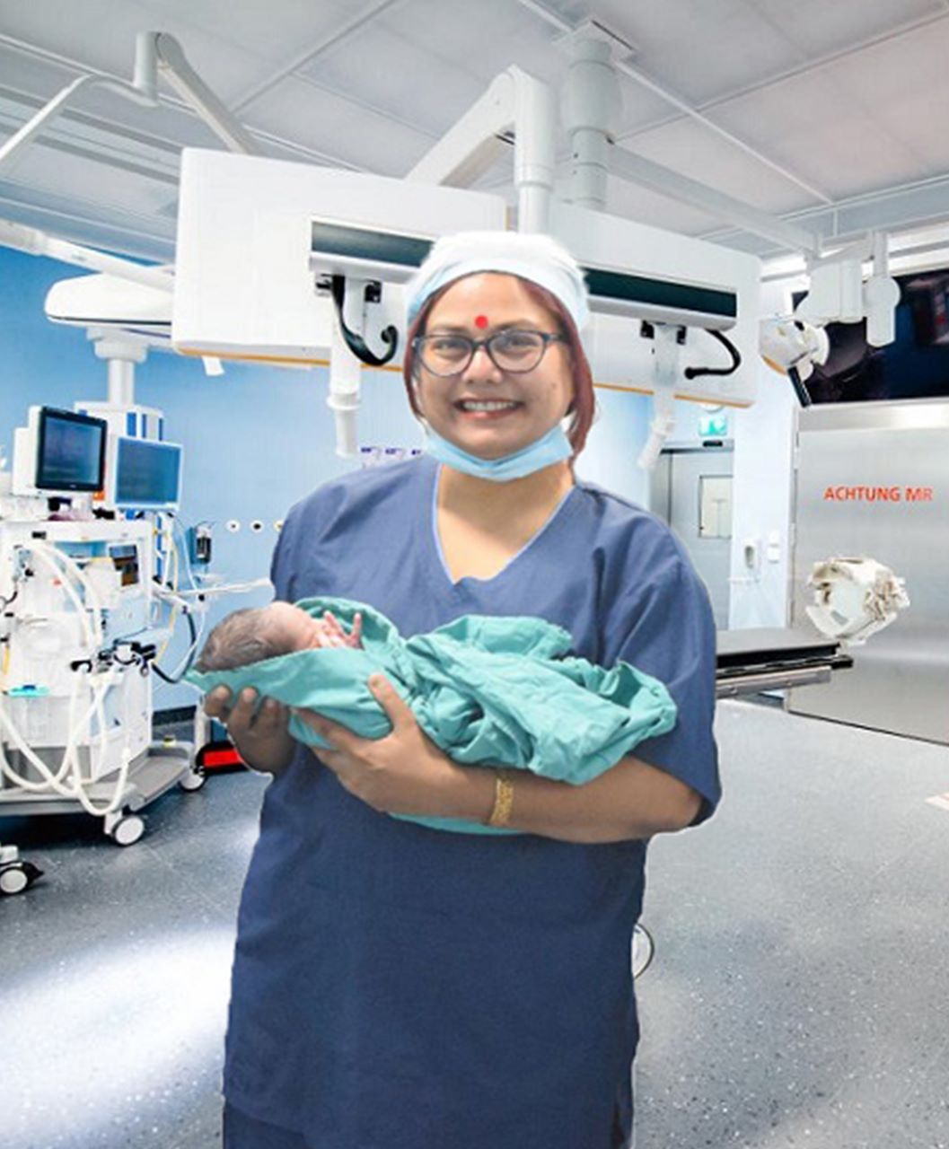 Dr. Anjana Jain with a newborn